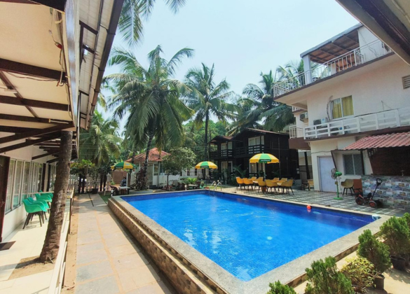 A refreshing swimming pool area at Beachwalk Resort, perfect for a leisurely swim.